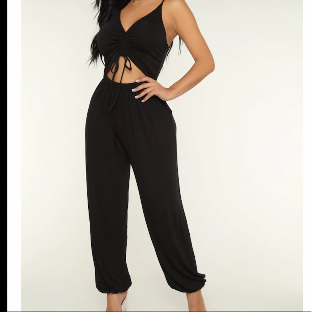 Fashion Nova jumpsuit new with tags. Small.